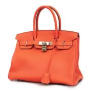 Hermès Vintage Pre-owned Laeder handvskor Orange, Dam