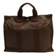 Hermès Vintage Pre-owned Canvas handvskor Brown, Dam