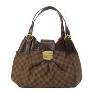 Louis Vuitton Vintage Pre-owned Canvas handvskor Brown, Dam