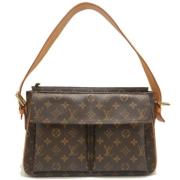 Louis Vuitton Vintage Pre-owned Canvas axelremsvskor Brown, Dam