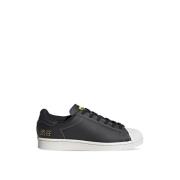 Adidas Stiliga Unisex Lädersneakers Modell H04796 Black, Dam